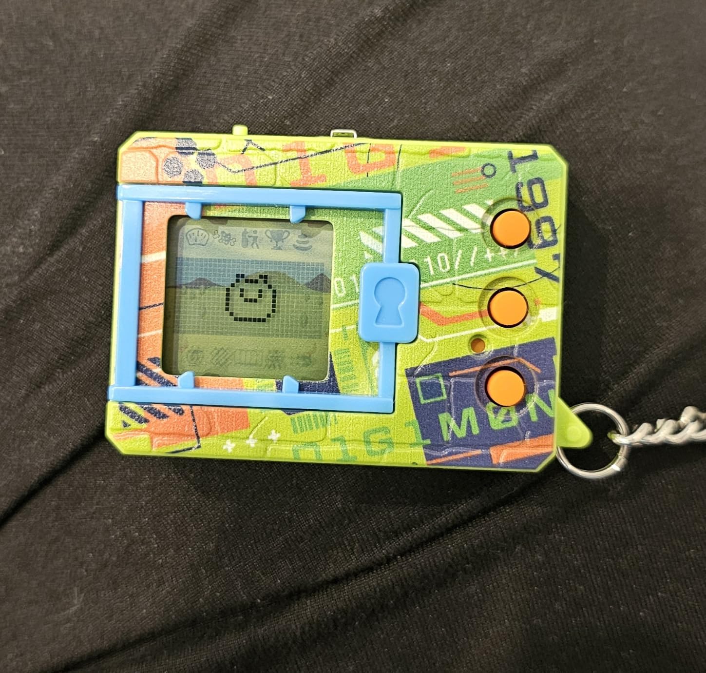 Bandai Digimon Agumon Digivolution animale virtuale arancione